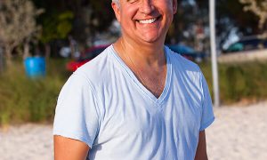 Can I Cure Erectile Dysfunction? Grey Hair Guy at Beach